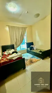 Two bedrooms and a living room for annual rent, furnished, in Ajman, City Towers, Al Nuaimiya 3, Kha