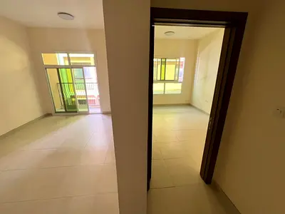 أول ساكن | غرفة وصالة للإيجار في المويهات 3 | شهر مجاني | 34,000 درهم