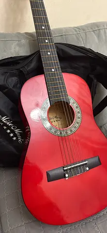 Red classical acoustic guitar - good used condition