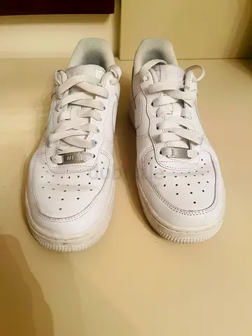 Original White Nike Air Force 1 sneakers, barely used. purchased from Level 42, Dxb Mall. Size: US 6