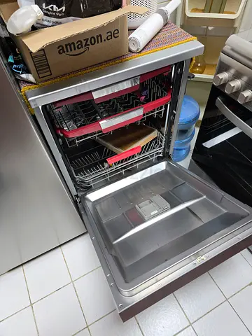 Built-in Dishwasher in Good Working Condition — Stainless Interior, small broken side