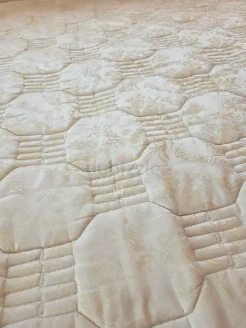 Queen size quilted mattress in good condition