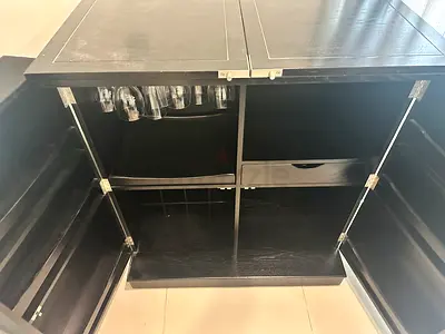 Black wooden bar table with storage drawer - good condition