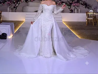 Elegant off-shoulder long sleeve bridal wedding gown with detachable overskirt