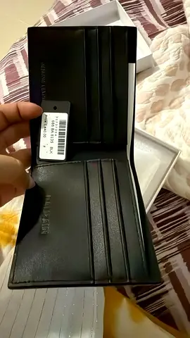 Genuine leather black bi-fold wallet - brand new with tag