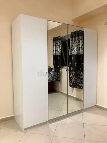 White 4-Door Wardrobe with Mirrored Center Doors - Good Condition