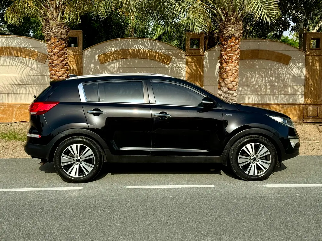 Kia Sportage 2014 — photo 1 of 18