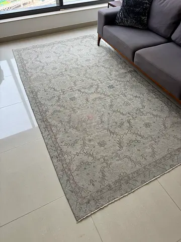 Light grey patterned woven rug