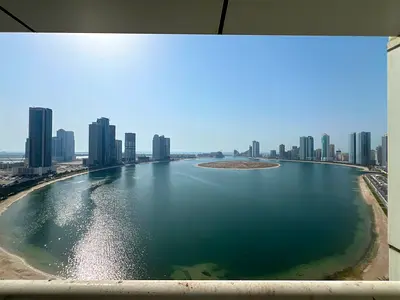Spacious 2BR + Hall: Sea View Balcony, Large Kitchen with Balcony, Free Parking & Maintenance