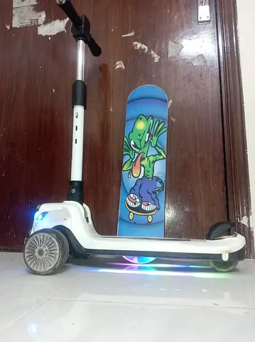 Kids LED Electric Scooter with Small Skateboard - Good Condition