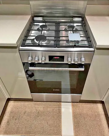 Stainless Steel 4-Burner Gas Cooker with Electric Oven - Good Condition