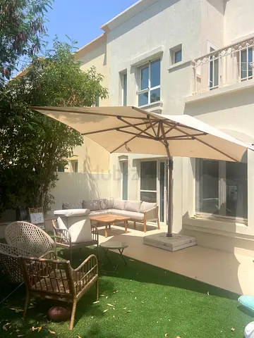 Large outdoor umbrella with base