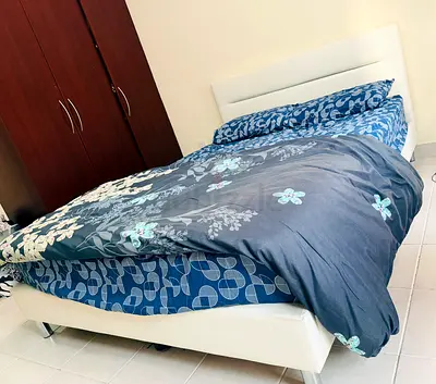 White faux leather queen bed with mattress and headboard - good condition
