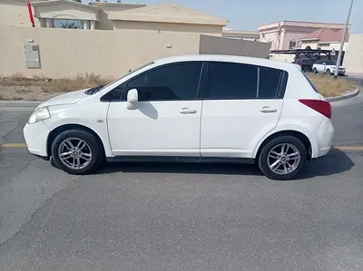 2010 Nissan TIIDA — фото 11