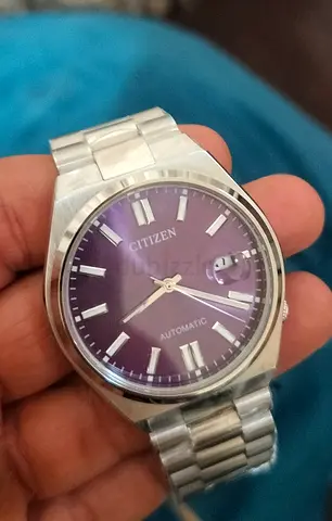 Citizen Tsuyosa Automatic watch, model NJ0200-50W, features a striking purple dial paired with a dur