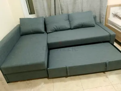 IKEA L shap Sofa store cum bed you can fix the storage lift or Right
