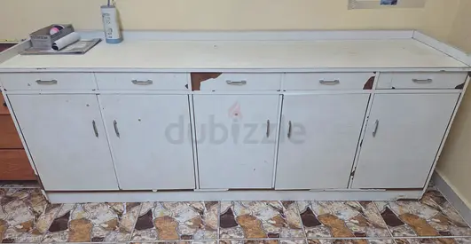 long white metal storage cabinet I’ve used for about 2–5 years