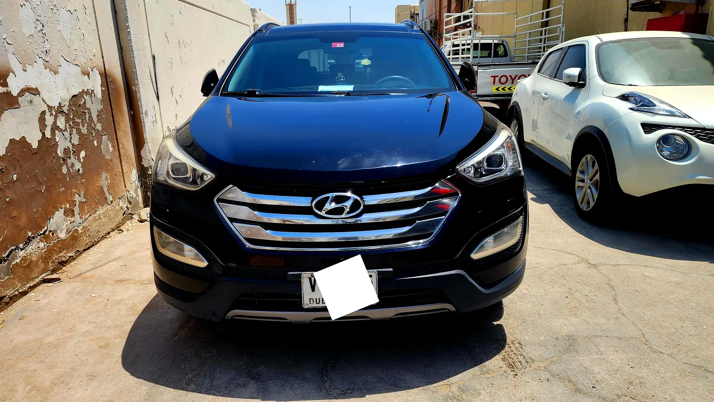 Hyundai Santa Fe 2016 — photo 1 of 11