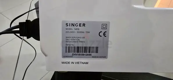 Singer Model 1409 Sewing Machine - Good Working Condition