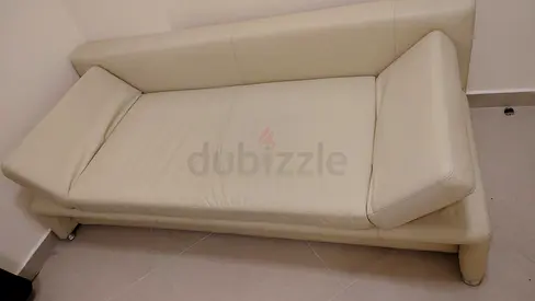 Light beige leather single sofa bed / daybed in good condition