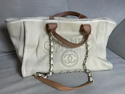Beige canvas CHANEL shoulder tote bag with pearl