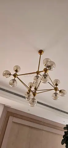 Modern Brass design lights and tables