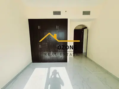 Elegant // 2-BEDROOM With Covered Parking // Free Maintenance // Family Building // Close to Muwail