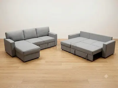 Light grey L-shaped sofa bed with storage - pulls out into large sleeper