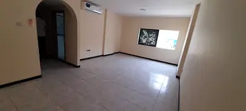 Luxury two-bedroom apartment for annual rent in Al Majaz 1, Sharjah. Features a master bedroom, thre