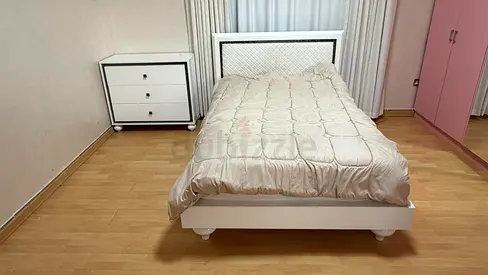 White single bed with headboard and matching nightstand - good condition