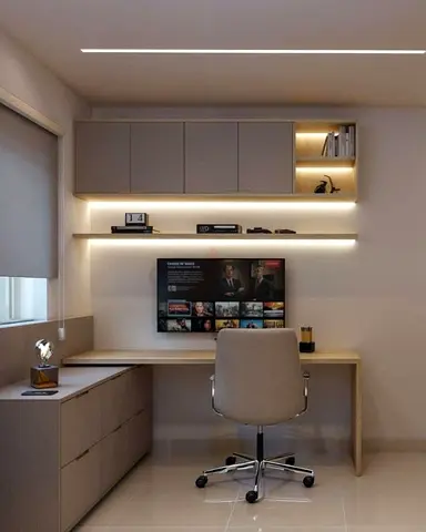 Modern wall-mounted study desk with overhead cabinets and shelves