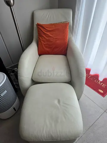 White leather reclining armchair with ottoman