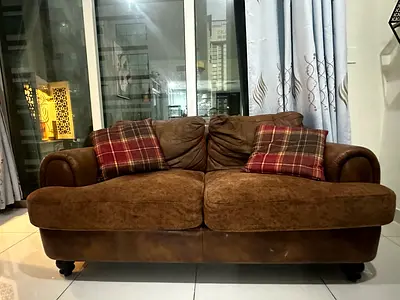Textured brown sofa set from home box used for 2 years 3 and 2 seaters listed for 300 AED