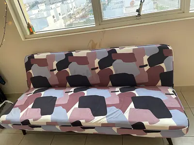 3-seater Sofa Bed with Geometric Cover — Good Condition but 1 leg broken