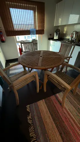 Solid wooden garden table with 4 chairs - good used condition