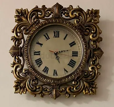 Vintage ornate wall clock with Roman numerals - gold/bronze finish