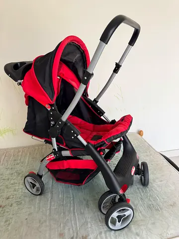 Red baby stroller / pram for sale