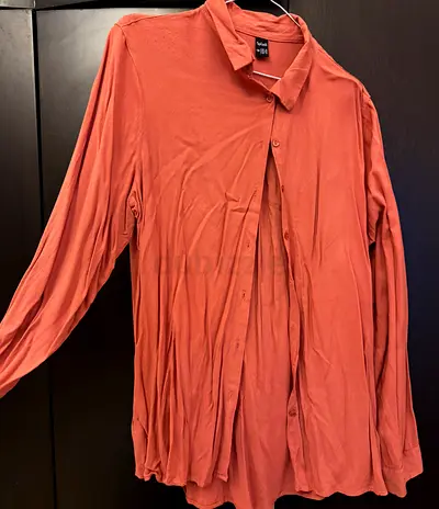 Women’s long sleeve button-up shirt - rust/coral, size M