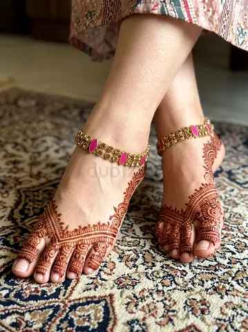 Gold-tone toe ring kundan anklets with pink enamel accents
