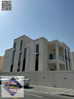 Corner villa for sale in Ajman, Al Rawda 2, including central air conditioning and elevator.