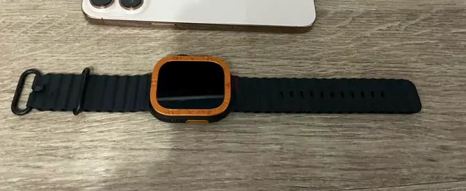 Original apple watch ultra black like new with many straps and protective cases