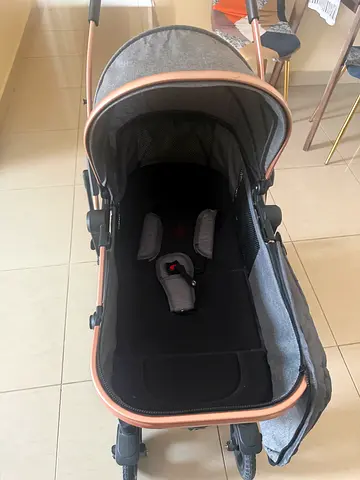 Lightweight pram stroller in good condition with canopy and harness