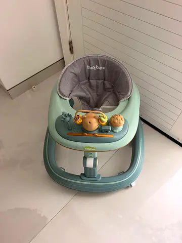 Light green baby walker with toy tray - excellent New condition
