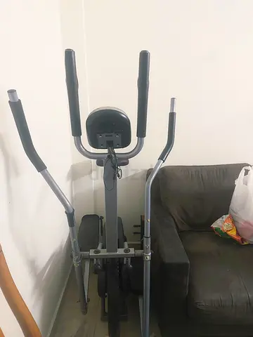 Used multi-function home exercise machine — upright pull/abs trainer