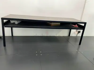 Long black table with lower shelf - sturdy modern design