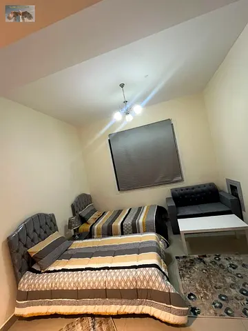 Furnished studio in Al Alia near Al Bait Al Muttahid, clean furniture, prime location with easy acc