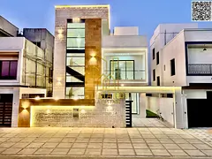Modern 6-bedroom villa with a roof terrace for sale in Al Bahia area. Super deluxe finishing, freeho