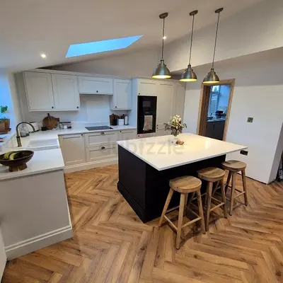 Modern kitchen island with storage cabinets and over hang