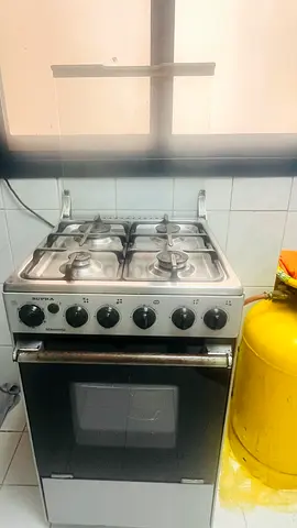 Used 4-Burner Gas Stove with Oven - Good Working Condition