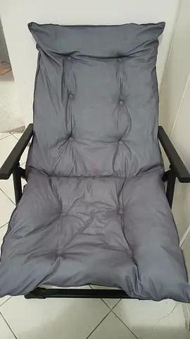 Comfortable Gray Reclining Chair with Padded Cushion